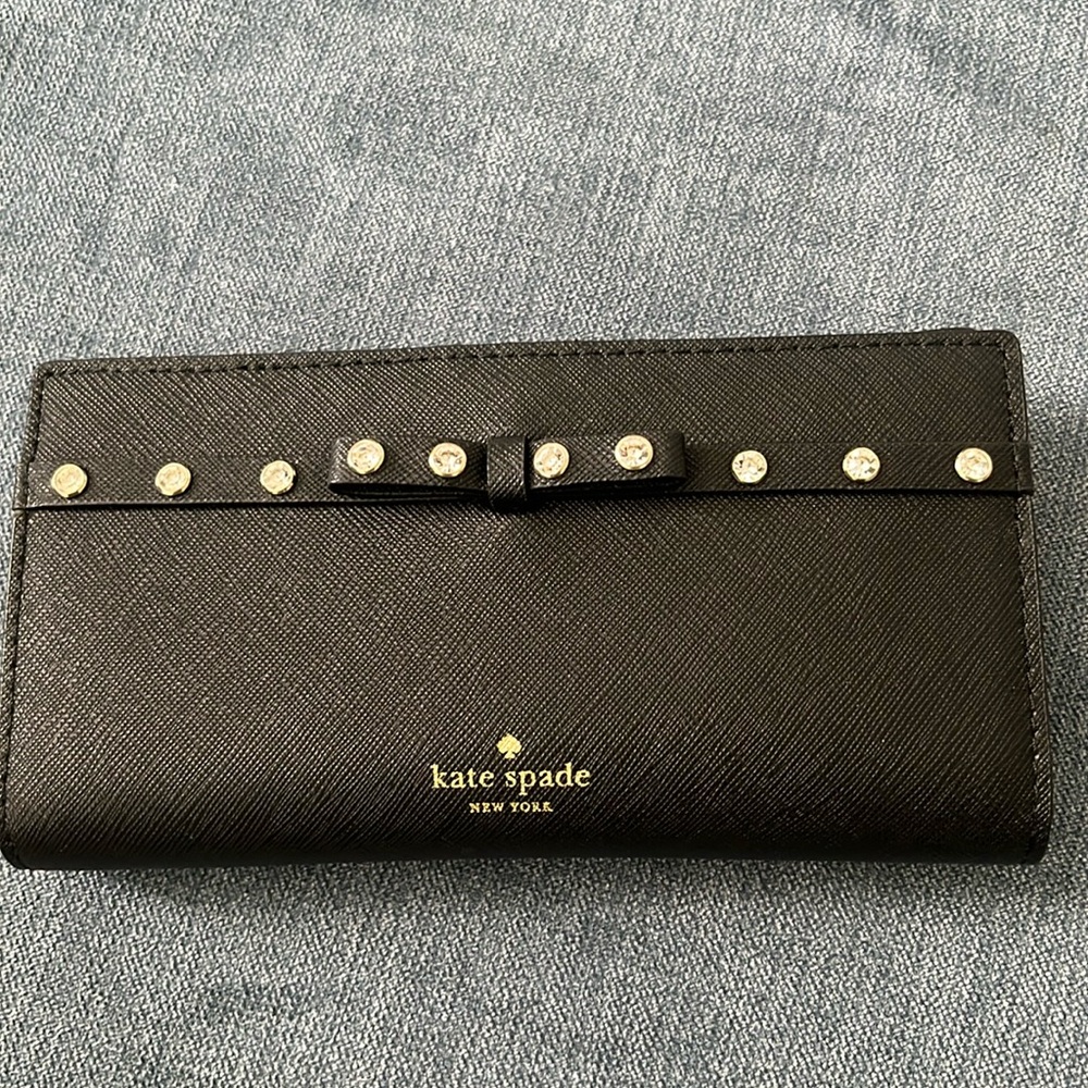 Kate Spade Laurel Way wallet with bow detail and crystal jewels